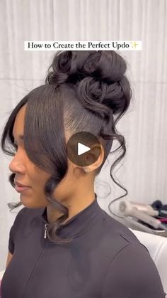 a woman with her hair styled into a bun