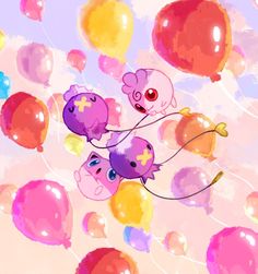 some balloons are floating in the air and one is pink with yellow cross on it