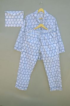 ITEM DESCRIPTION: 100% Pure cotton hand block printed night suit, perfect for summer while sipping tea on your terrace ! This pajama is made for a relaxed fit and allows for ease of movement throughout the night. Every piece can be made customized to your desires. Sleeve length - ( Long Sleeves ) Type : Sleepwear Gender : Women's Size Type : Regular Material : 100% COTTON FABRIC Garment Care : Hand Wash Color :- Base Color Is Multicolored Floral Prints Have been Crafted. Package Includes : 1 Set Pajamas Dress, Long Pajamas, Comfy Pajama, Bridesmaid Pajamas, Bridesmaid Pajama Set, Sipping Tea, Bridesmaid Pyjamas, Cute Pajama Sets, Cozy Pajamas