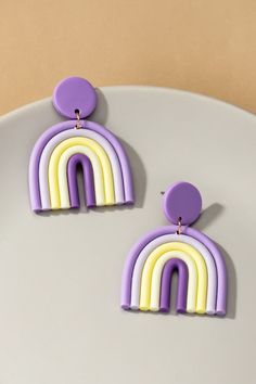 Add a playful pop of color to your outfit with our Rainbow Earrings! These quirky polymer clay arch drops are 1.75" x 2.25" and sure to make a statement. Unique Clay Earrings, Metal Post, Tanah Liat, Polymer Earrings, Beaded Tassel Earrings, Orange Earrings, Rice Bead, Summer Earrings, Earrings Polymer Clay