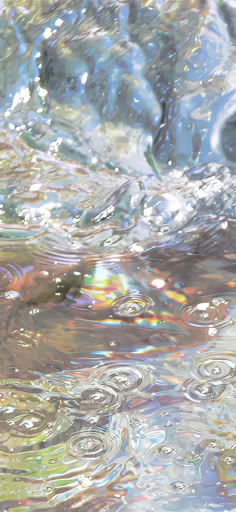 an image of water that is very close to the ground with some bubbles on it