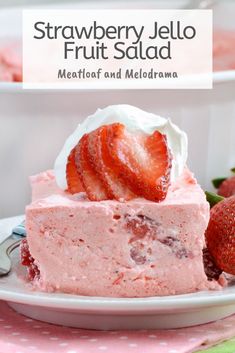 strawberry jello fruit salad on a white plate