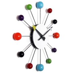 a clock with different colored balls on it