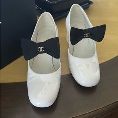 These Gorgeous Chanel Shoes Add So Much To An Outfit!! The Double C’s Are On Each Bow There Are Two Places On The Heels That Are Slightly Worn Off. Otherwise They Are In Great Condition!!!! Chanel Shoes Heels, Chanel Heels, Black Bows, The Double, Shoes White, Black Bow, Chanel Shoes, Vintage Chanel, Shoes Women Heels