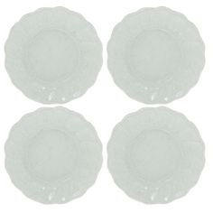 four clear glass plates sitting on top of each other