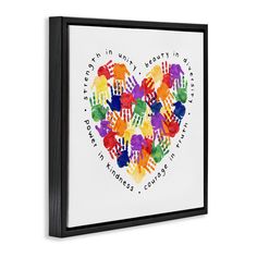 a colorful heart with hand prints on it