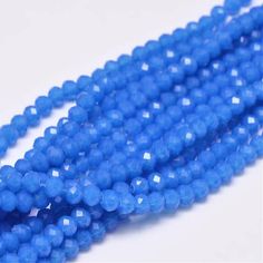 blue faceted glass beads, 6mmx5mm - 8mm strands