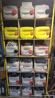 the shelves are filled with plastic containers and other things to use in this storage unit