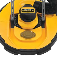 a close up view of the inside of a yellow and black robotic vacuum with wheels