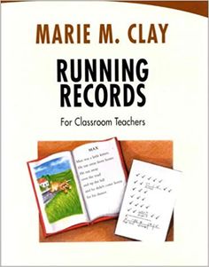 the book running records for classroom teachers by marie m clay, with an open book on it