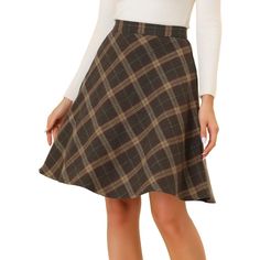 This skirt is timeless thanks to the plaid prints and easy a-line silhouette. Add plaid patterns to your transitional wardrobe with the skirt. It is made to sit high on the waist with an elasticated waistband for a flattering silhouette. Team yours with a chunky knit jumper and Chelsea boots for a versatile work-to-weekend style. You can pair this skirt with boots and overcoats for a warmer outfit. These fashionable clothes for women can not only be worn daily but can also be easily matched as a Plaid Overall Dress, Chunky Knit Jumper, Skirts With Boots, Suspender Skirt, Vintage Rock, Weekend Style, Vintage Plaid, Bag Crochet, Plaid Skirt