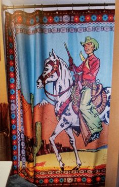 Bring some of your favorite Fringe Scarf designs HOME! The Ranger in brown is a new scarf design this season and now one of eleven different shower curtain designs to help liven up your bathroom. We love the Ranger in brown for a fun retro vibe or an addition to your little cowgirl or cowboy's bathroom, or for just plain old fun! The perfect baby gift! Also available in Pink *100% polyester - machine washable. Iron on polyester setting. Comes with set of silver shower rings. Size - 70” x 70.5”. Cowboy Bathroom, Western Interior Design, Cowboy Shop, Cabin Interior Design, Scarf Designs, Shower Rings, Rodeo Cowgirl, Cabins And Cottages, Fringe Scarf