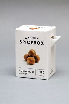 a box of spicebox nuts on a gray background