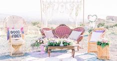 an outdoor setting with wicker furniture and flowers