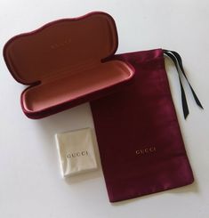 New Authentic Gucci Sunglasses Eyeglasses Case Burgundy Velvet Clamshell Case, comes with Gucci drawstring ribbon dust bag and Gucci cleaning cloth. Gucci Glasses Case, Gucci Sunglasses Case, Music Supplies, Gucci Glasses, Eyeglasses Case, Case Ideas, Burgundy Velvet, Burgundy Wine, Gucci Sunglasses