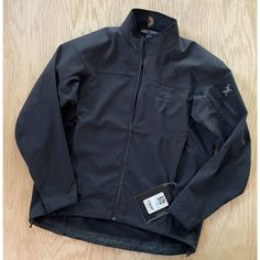 Nwt Mens Arcteryx Epsilon Ar Jacket Black Windbreaker Branded Color Black Size Xl Chest 25 Length 31 Brand New With Tags. Looks Fantastic And The Colors Are Great. You Will Be Pleased! Please See Photos For Measurements. Arcteryx Windbreaker, Arcteryx Jacket, Arcteryx Mens, Black Windbreaker, Mens Windbreaker, Black Sapphire, Lightweight Jacket, Brand Colors, Zip Ups