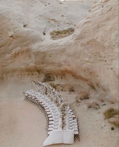 a long table set up in the desert for an event