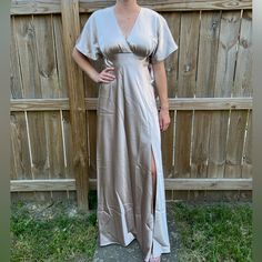 New With Tags! Never Worn, Floor Length, Birdy Grey, Satin Taupe Bridesmaid Dress. Spring Satin Maxi Dress With Short Sleeves, Satin V-neck Maxi Dress With Tie Back, Summer Floor-length Satin Bridesmaid Dress, Spring Full Length Bridesmaid Dress, Flowy Floor-length Satin Dresses, Lined Satin Maxi Dress, Beige Short Sleeve Bridesmaid Dress, Beige V-neck Dress For Wedding Guest, Beige Satin V-neck Dress