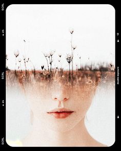 a woman's face with dandelions growing out of the top of her head