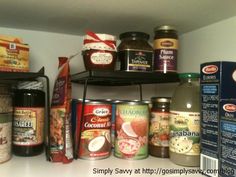 an organized pantry with canned food and condiments