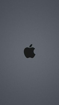 an apple logo is shown on the back of a macbook pro