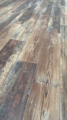 an image of wood flooring that looks like it is made from old planks