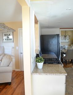 the kitchen is clean and ready to be used as a living room or dining area