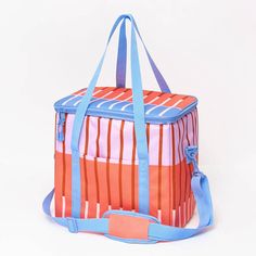 an orange and blue striped lunch bag on a white background