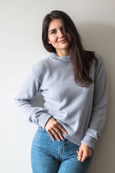 This sweater is so versatile that can be worn with any of your off-duty staples, as well as a part of your everyday wardrobe. Finely knitted from Italian Merino wool that feels soft against your skin, it has a slightly relaxed fit, classic crew neck and rolled sleeves. - Italian merino wool - Slips on - 100% wool - Dry clean - Size S Please Check out Our Knitted Sweater Collection https://www.etsy.com/listing/563044913/silk-and-baby-alpaca-long-sweater https://www.etsy.com/listing/546574970/moha Basic Sweater, Basic Sweaters, Sweater For Women, Rolled Sleeves, Grey Knit Sweater, Sweater Collection, Sweater Grey, Long Sweater, Pullover Sweater Women