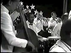 a group of men playing musical instruments in front of stars