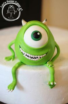 a close up of a cake decorated to look like a monster