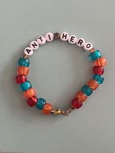 Eras Tour Anti Hero Outfit, Eras Movie Bracelet Ideas, T Swift Bracelet Ideas, Anti Hero Taylor Swift Bracelet, Taylor Swift Friendship Bracelet Ideas Midnights, Midnight Friendship Bracelet, Midnights Taylor Swift Bracelet, Anti Hero Bracelet