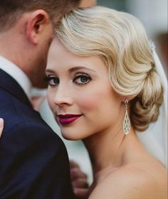 a bride and groom pose for a wedding photo in front of an instagram page