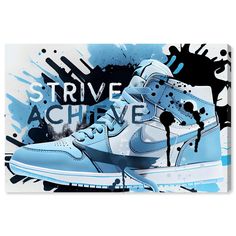 a pair of sneakers with the words strike achieve on it and paint splatters