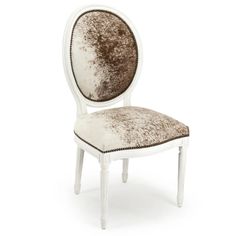 a white chair with a brown and white upholstered seat