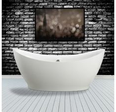 an empty bathtub in front of a brick wall with a cityscape on it