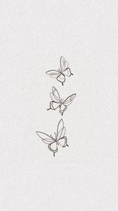 three butterflies flying in the air with one being drawn on it's back side