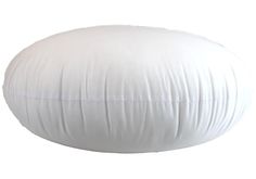 a large white round pillow on a white background