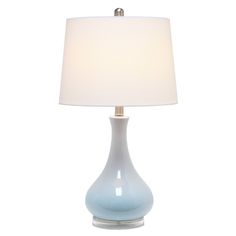 a blue lamp with a white shade on it