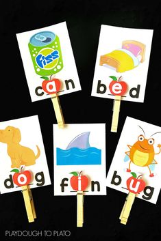 four printable cards with pictures of animals and letters on them