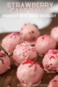 strawberry cake balls with sprinkles on a wooden surface and text overlay that reads, strawberry cake balls perfect bite sized dessert