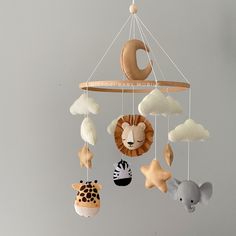 a mobile that has various animals hanging from it