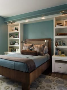 a bed room with a neatly made bed and shelves