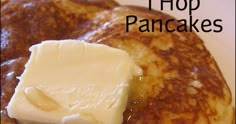 pancakes topped with butter and syrup on top of a white plate that has the words, top pancakes written in black