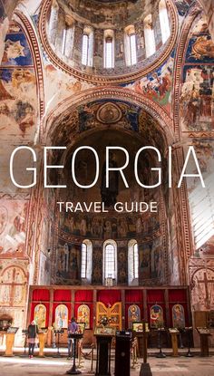 the cover of georgia travel guide, with an image of a church in the background