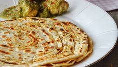 there are several flat breads on the plate