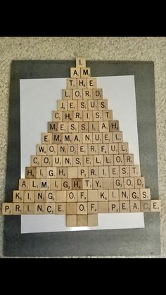 a scrabble christmas tree made out of words