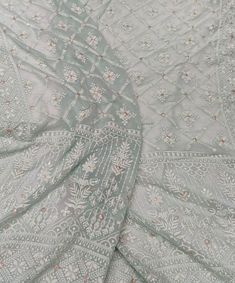 Pure Chikankari saree with very heavy and intricate murri  embroidery, embellished with handwork allover. Pallu and body fully embroidered. The color of the actual product may slightly differ from the pictures. It comes with an unstitched blouse, if you want the blouse stitched please contact me, the blouse can be stitched with an additional cost. Hand embroidered items may have some loose threads. Fabric: Pure Chikankari Work: Chikankari Wash: Hand Wash/Dry Clean Product color may slightly vary due to photographic lighting sources or your monitor settings. NOTE: All our items are handmade and specially customized for our beautiful customers. Please expect minor variations in the actual product as compared to the image displayed. Product color may slightly vary due to photographic lighting Chikankari Sari, Lucknowi Chikankari Saree, Chikankari Saree, Chikankari Work, Embroidered Items, Lucknowi Chikankari, Wedding Saree, Photographic Lighting, Saree Wedding