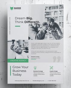 a brochure is displayed on a white wooden background with green accents and the words dream big, think different