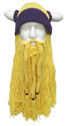 a yellow viking hat with horns and braids